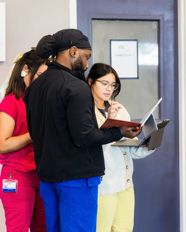 Healthcare provider helping a patient